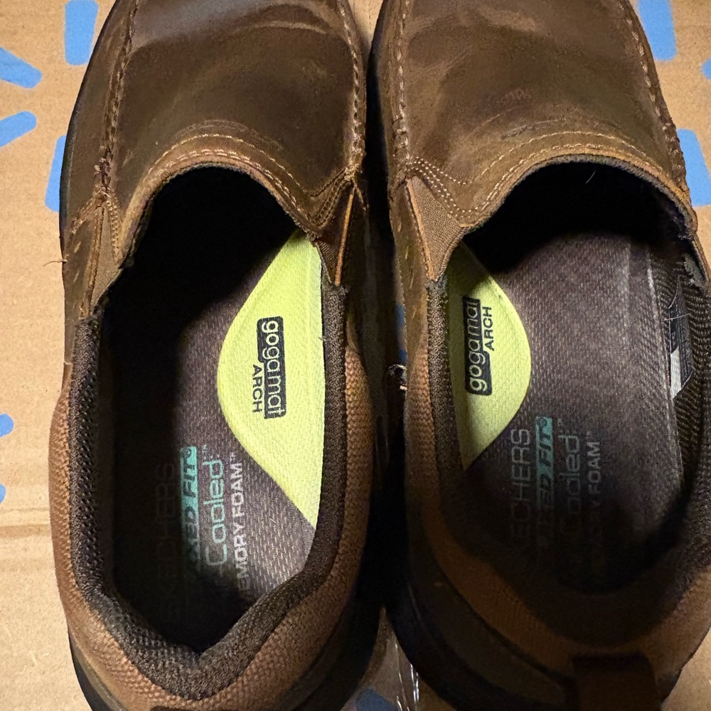 Skechers Men's Dark Brown Slip-On Loafers.
